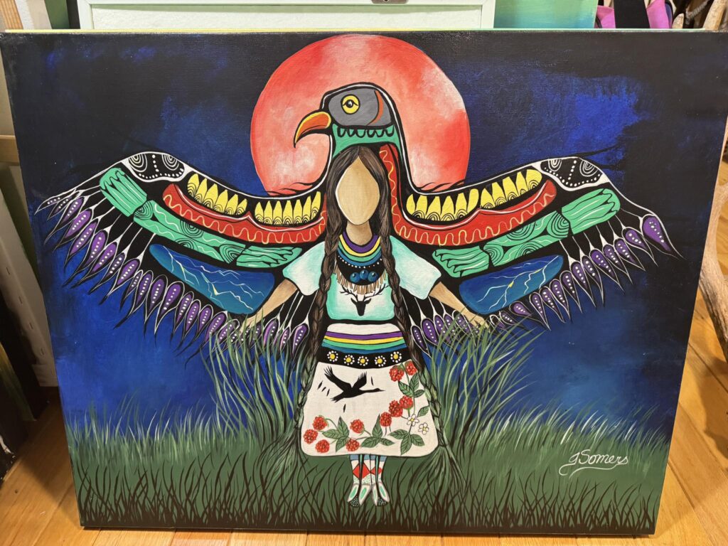 Jessica Somers explaining the philosophy of art as medicine and Indigenous reconciliation through Woodland style painting in Northern Ontario.