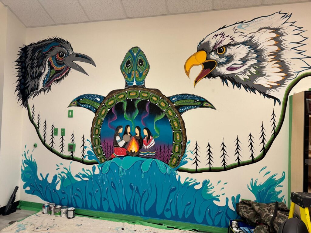 A close-up view of high-quality exterior acrylic paints and brushes being used on a textured brick wall, showcasing the application process on rough surfaces.